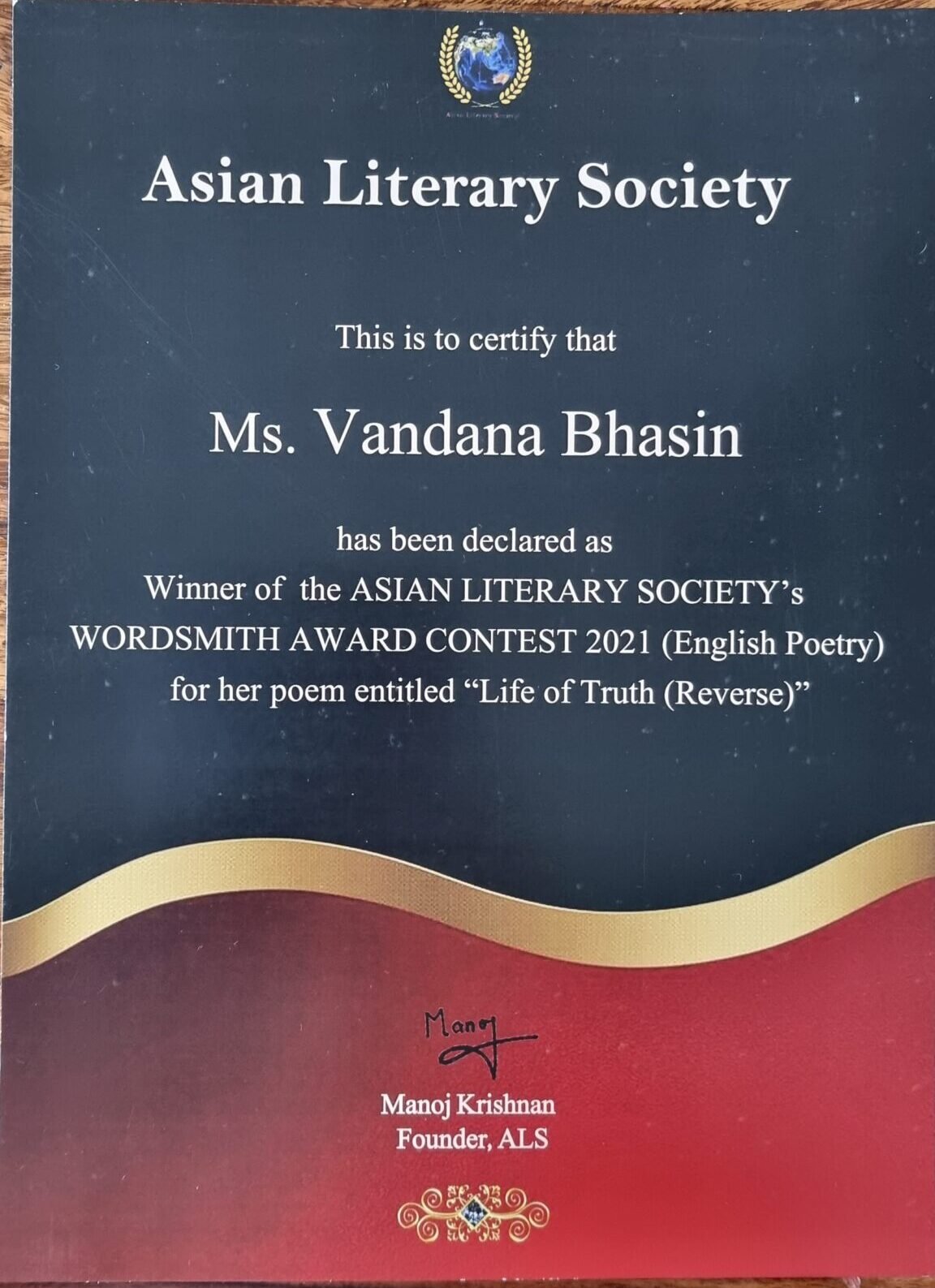 A literary award certificate presented to Vandana Bhasin