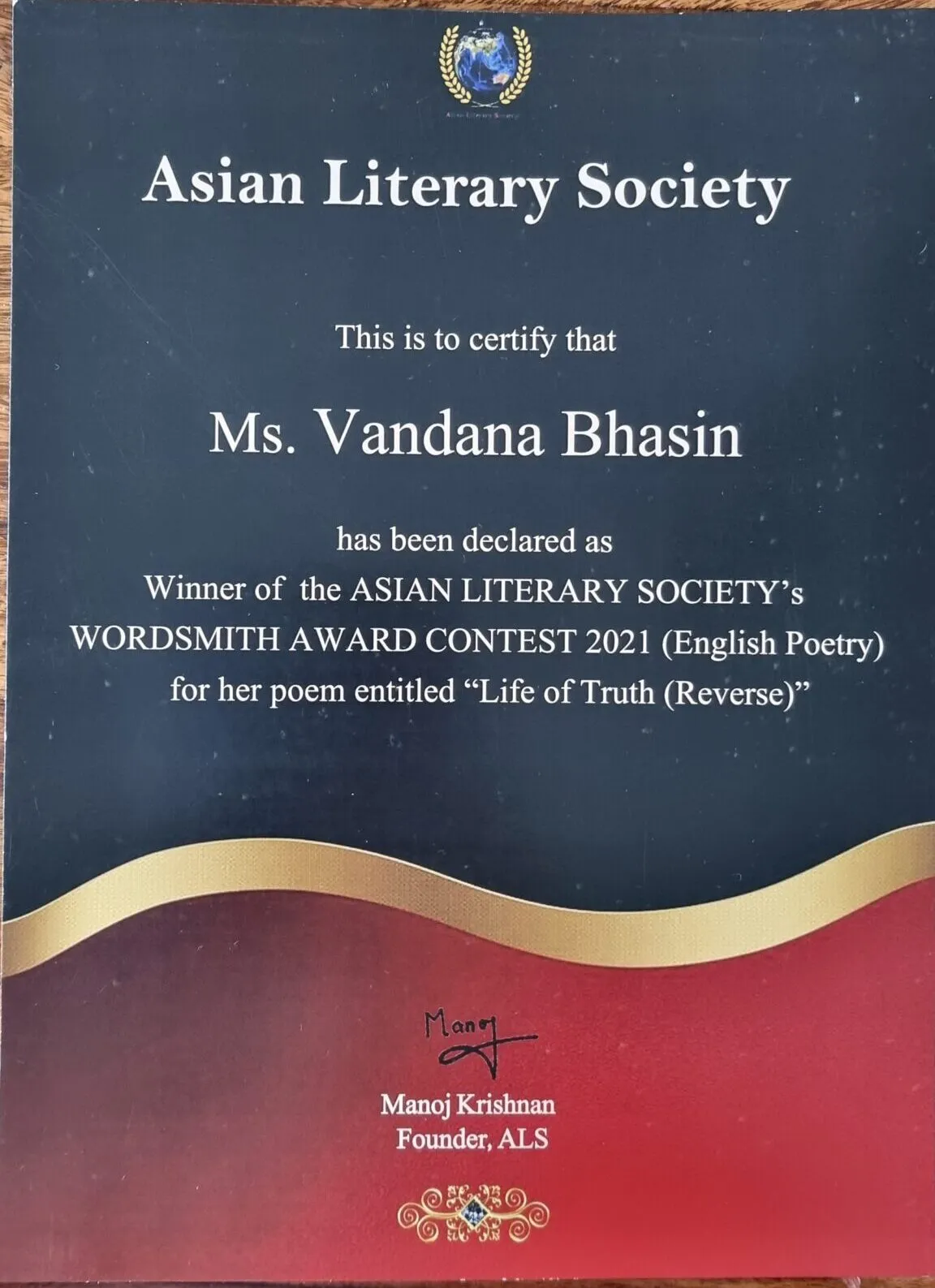 A literary award certificate presented to Vandana Bhasin